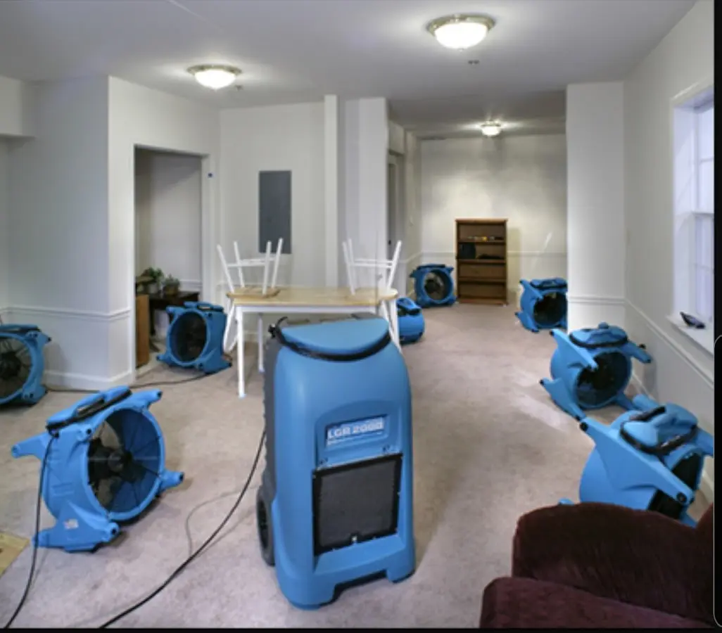 Air movers and dehumidifier setup for Water Damage Restoration in Kennedale